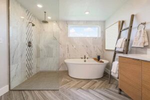 Custom Bathroom Remodel with Glass Shower Enclosure and Bath Tub