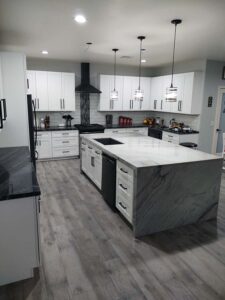 Kitchen Remodel with Island, Cabinetry, and Flooring